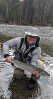 Grant Brown with his first steelhead caught on the fly
